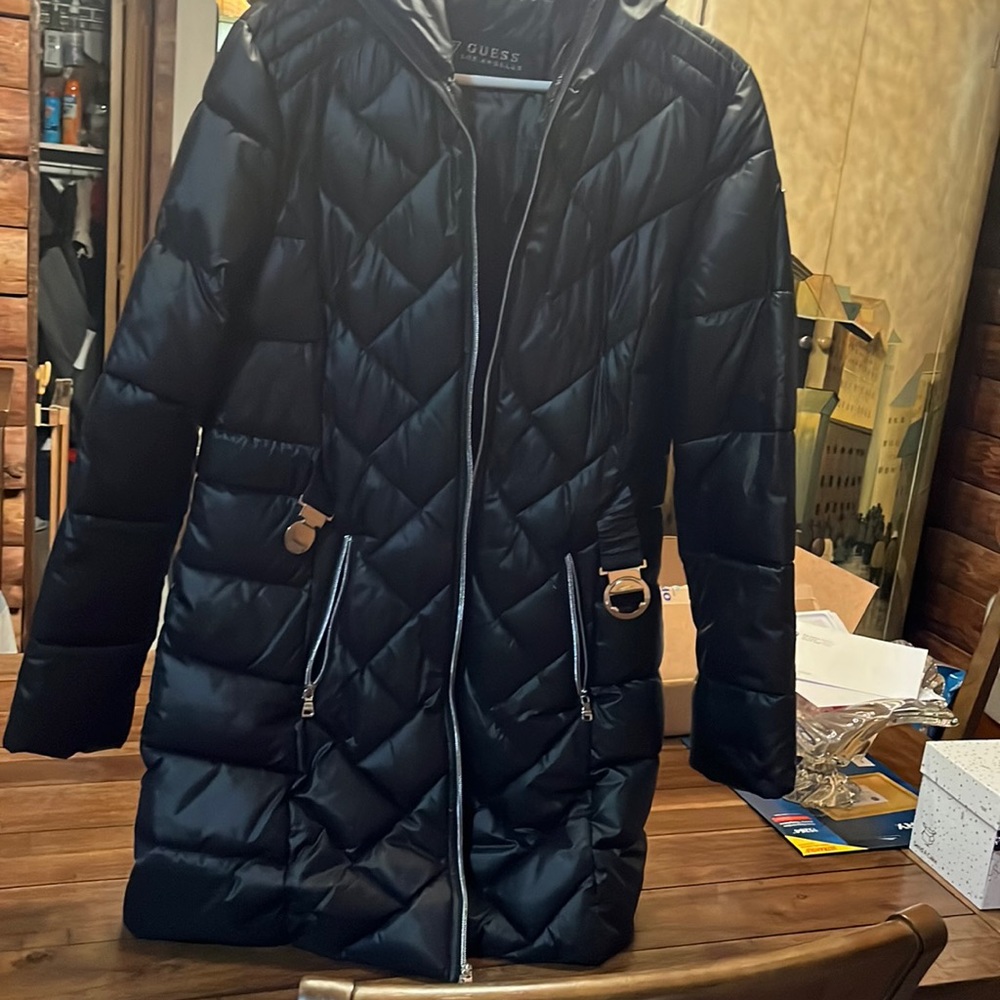 Guess woman’s coat.